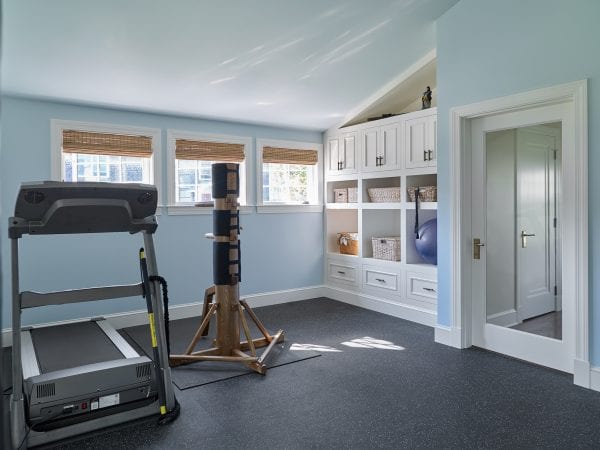 At home gym with storage and natural light