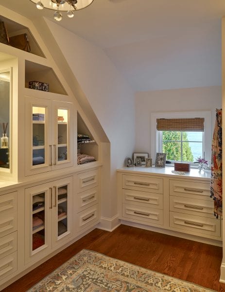 The walk-in closet with built-in dresser
