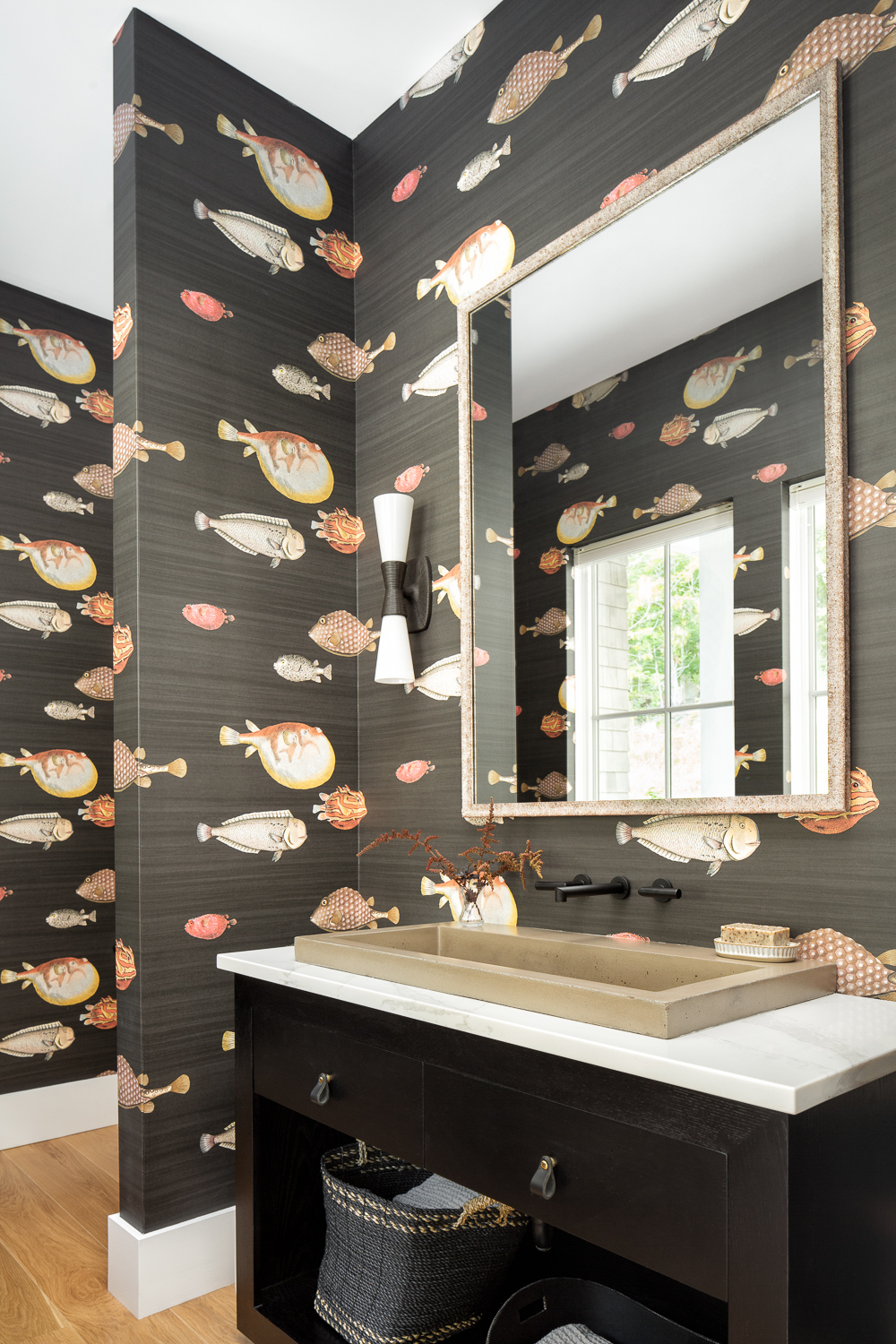 Powder room featuring fish motif wallpaper