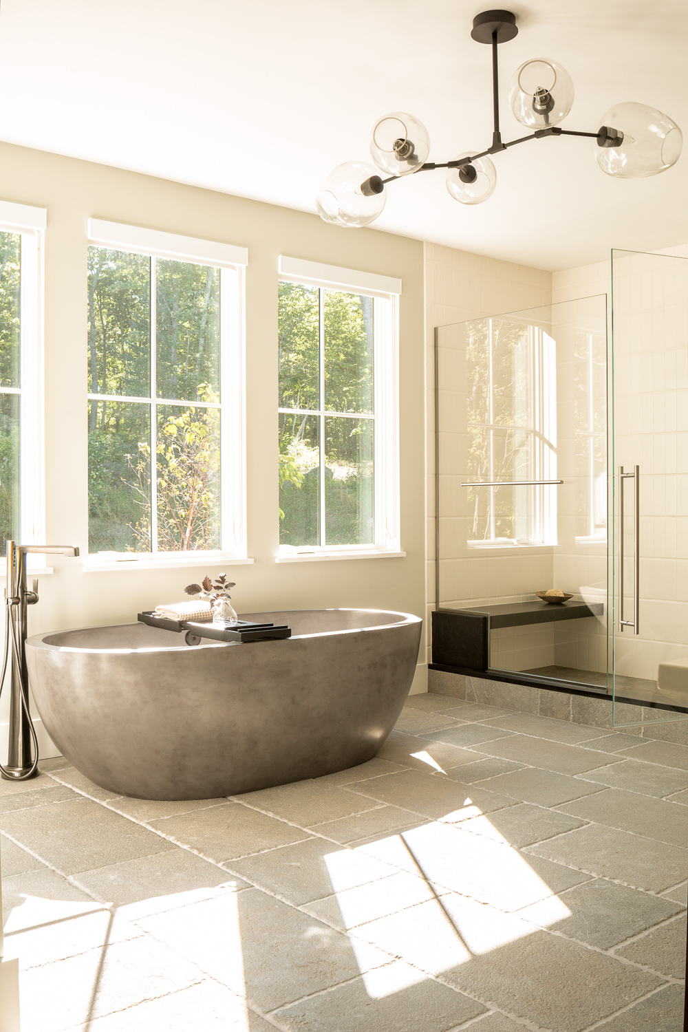 Stone soaking tub with large walk in shower