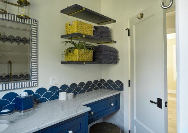 View of storage in guest bathroom
