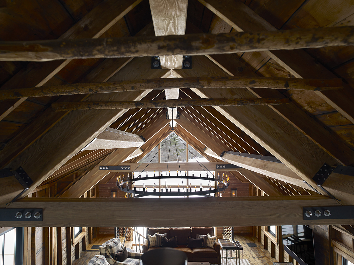 The real raw wood adds to the rustic feel with the exposed beams and large chandelier