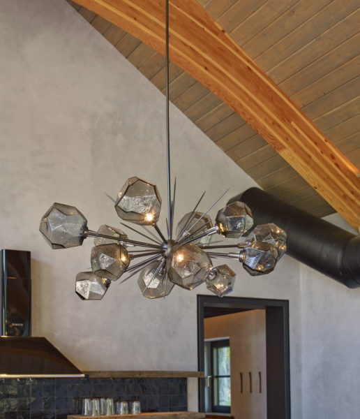 Statement light fixture with exposed beams