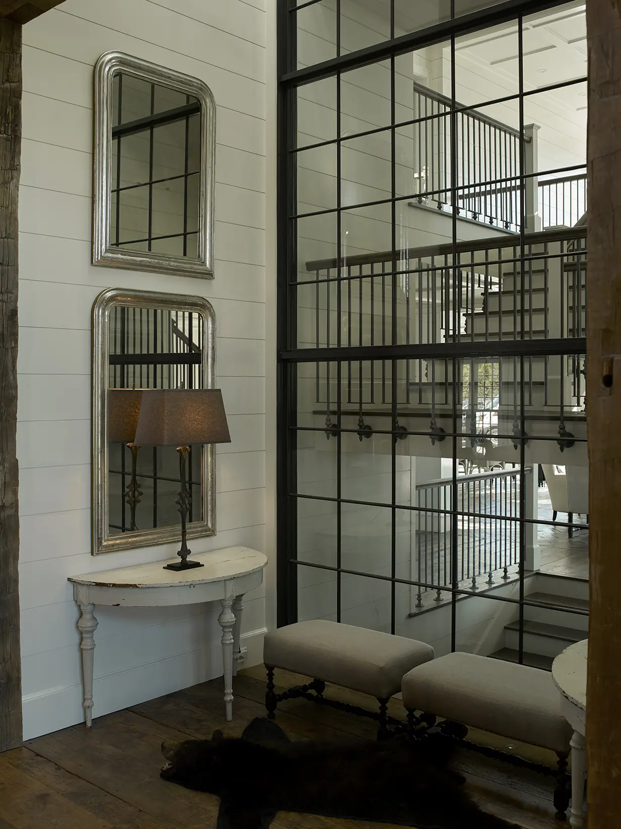Glass wall with view to the dramatic central staircase