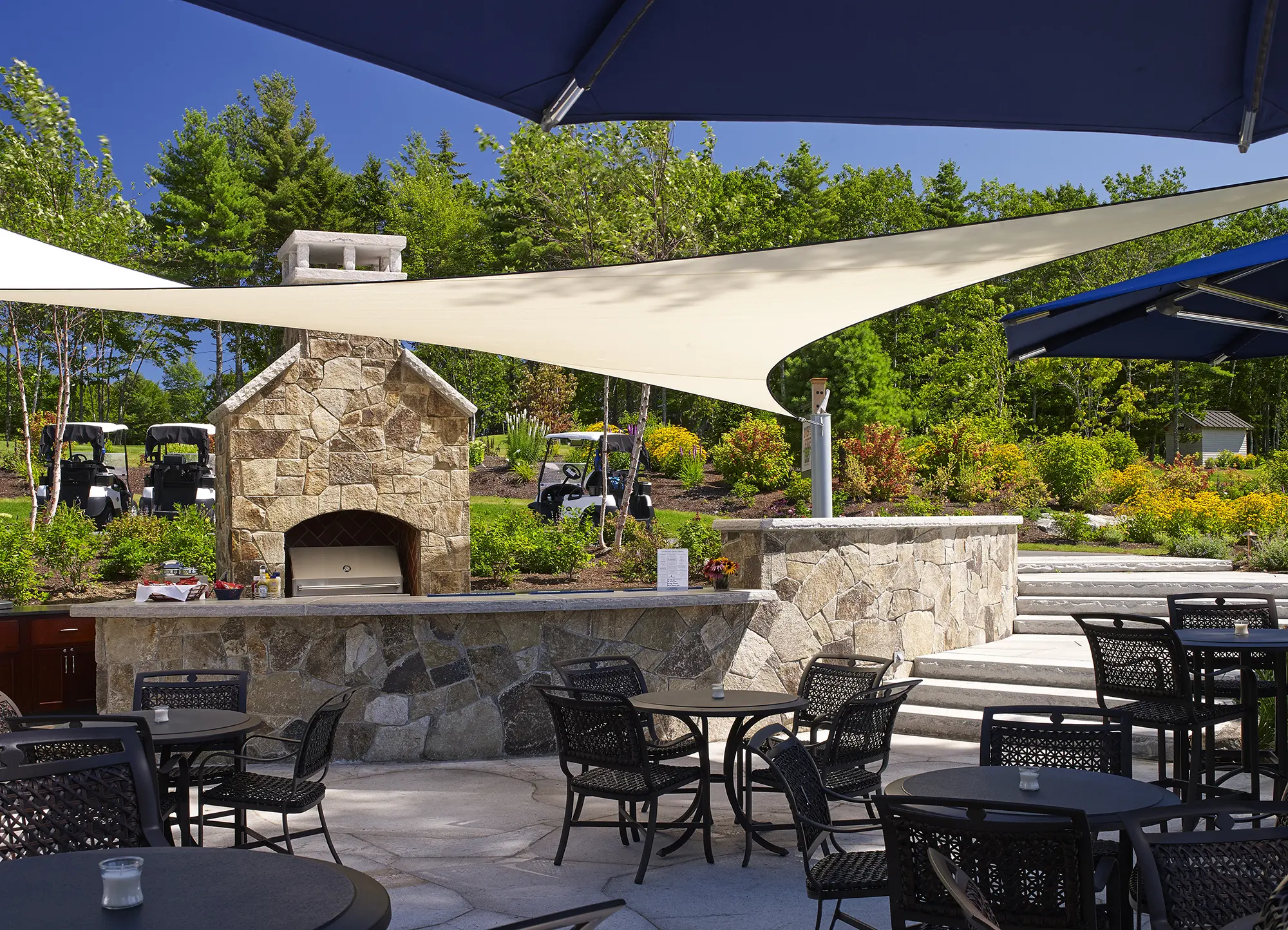 View of outdoor kitchen from dining area