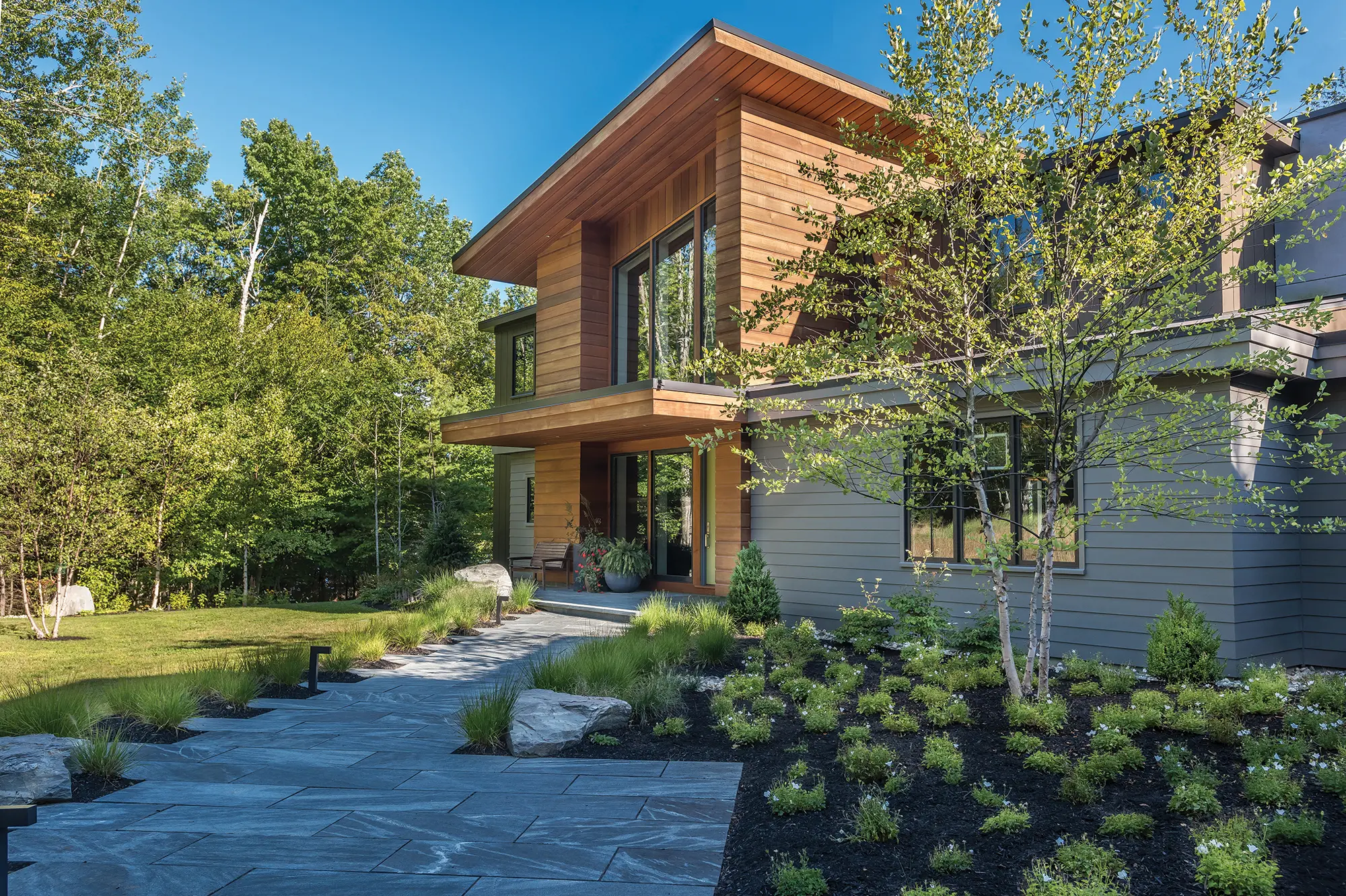 The stone walkway leading to contemporary home, Tides Ledge