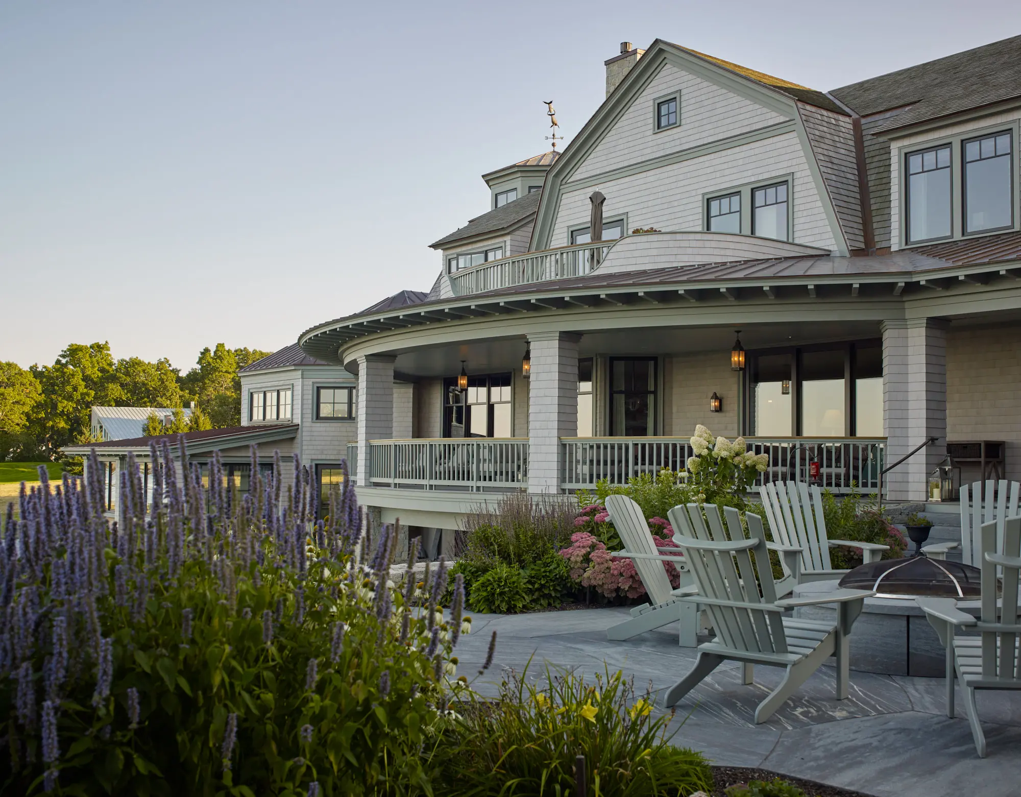 Pulpit Rock patio with floral garden and curved deck.